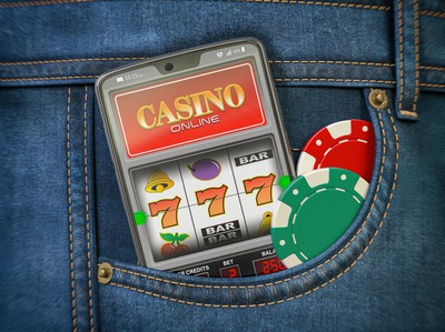 A cell phone with a mobile casino app is seen sticking out of a pocket in a pair of jeans. 5 Best Mobile Casinos in the US 2023